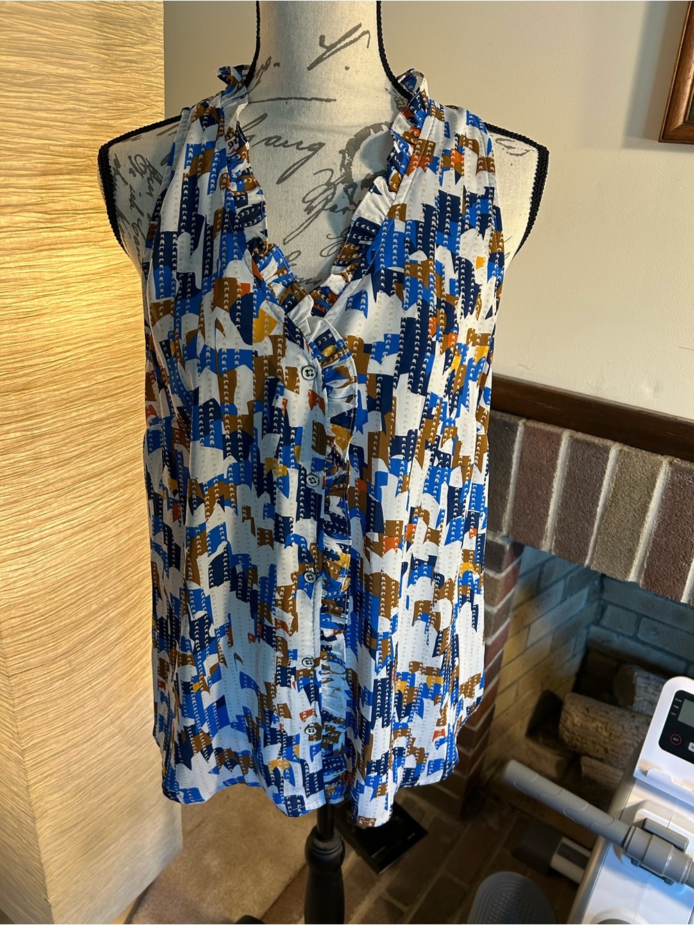CAbi Sleeveless Ruffle V-Neck Blouse in Blue, Brown & White